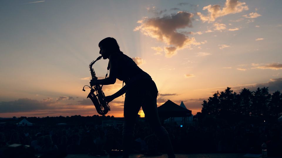 Silhouette of a saxophonist at sunset, Trident Festival 2026