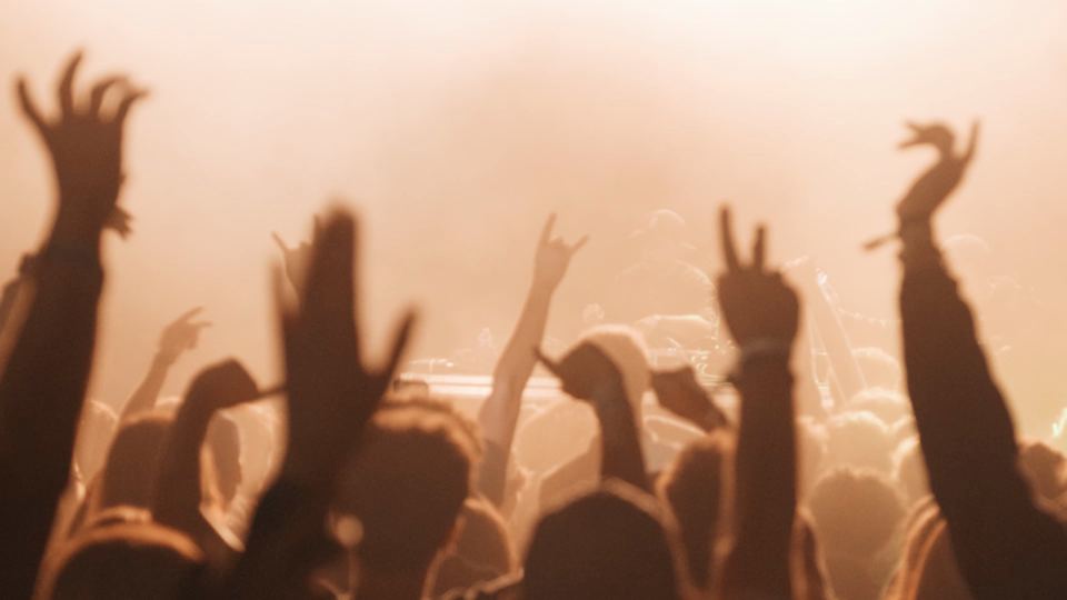 Hands raised in the light, Trident Festival 2025